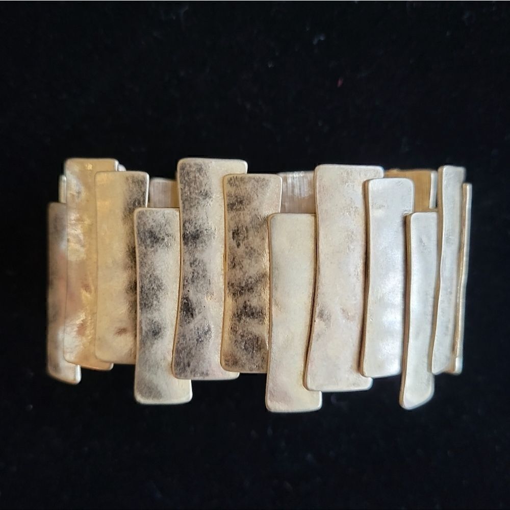 Gold stretch cuff bracelet. Costume jewelry, fashion jewelry, statement jewelry.